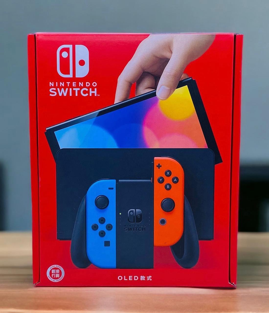 NINTENDO SWITCH OLED CONSOLE WITH BLUE-RED JOY-CON thumbnail 2